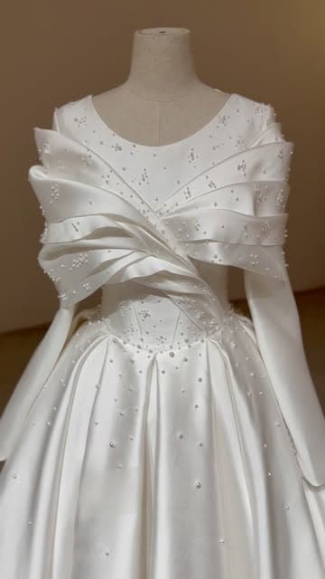 @julyfocusweddingdress's Instagram post posted on date 8/9/2026 which generated 429 likes and 2 comments