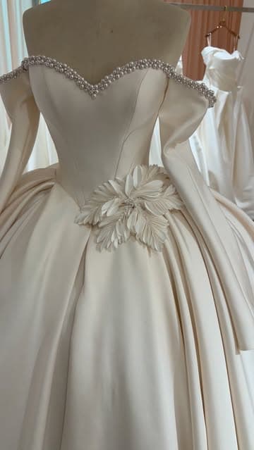 @julyfocusweddingdress's Instagram post posted on date 8/21/2026 which generated 619 likes and 3 comments